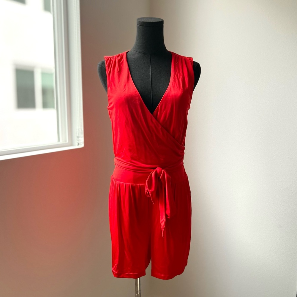 Bebe Coral Romper with Ribbon Belt in Size XXS/XS